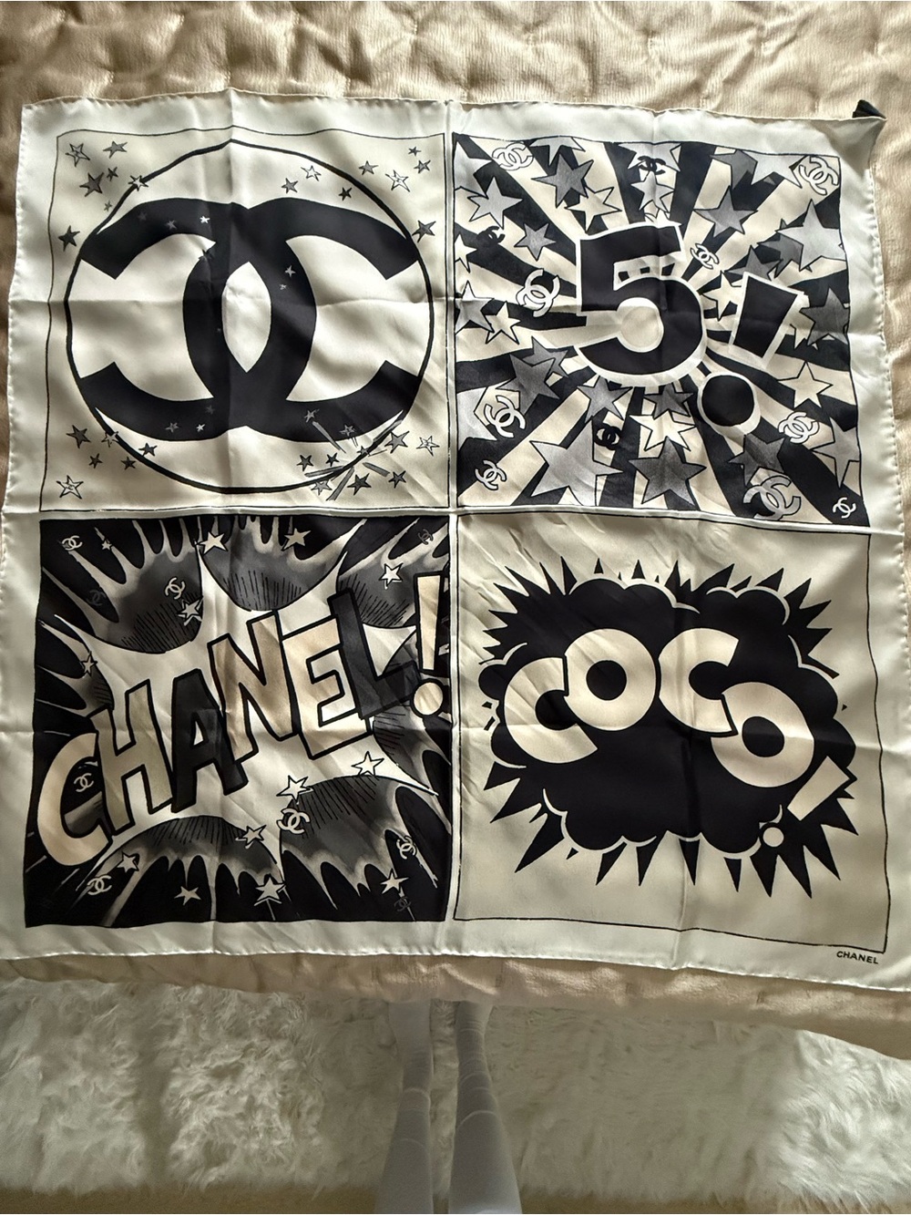 CHANEL Black Logo Tag on Cream Fabric
